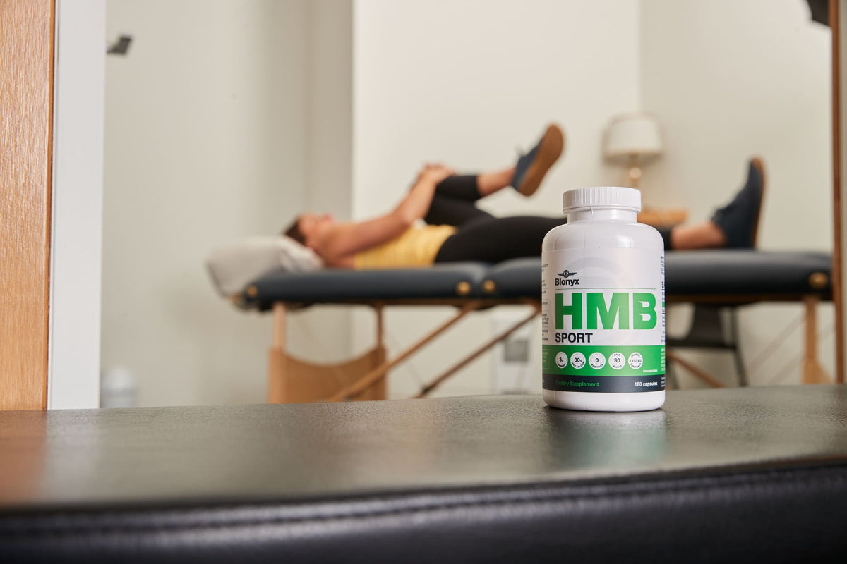 Athlete in Physio with a bottle of Blonyx HMB Sport in the foreground