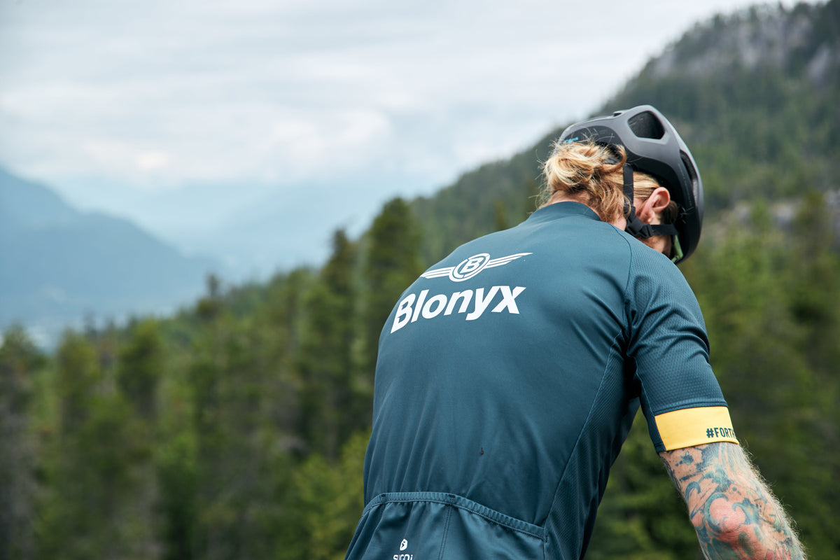 Blonyx athlete riding a gravel bike