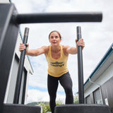 Hybrid athlete pushing a weighted sled