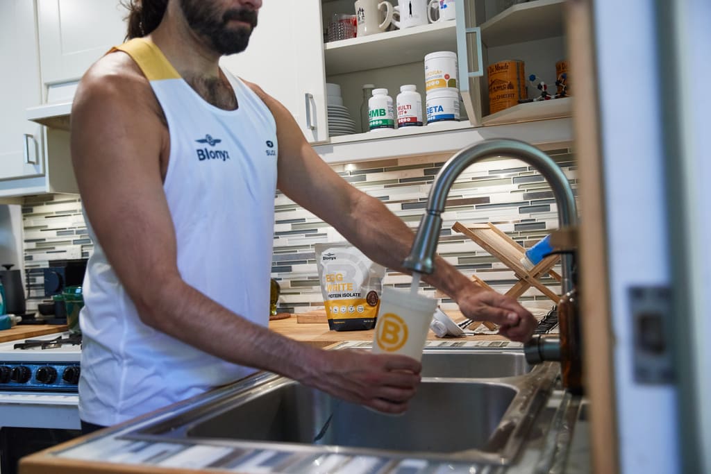 Athlete Making Blonyx Egg White Protein Isolate Shake
