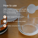 Instructions for using HMB+ Creatine with a scoop and glass on a wooden surface.