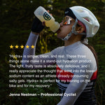 Professional cyclist Jenna Nestman drinking Blonyx Hydra+ energy and electrolyte drink during a ride, highlighting real-food hydration, performance nutrition, and endurance training support.