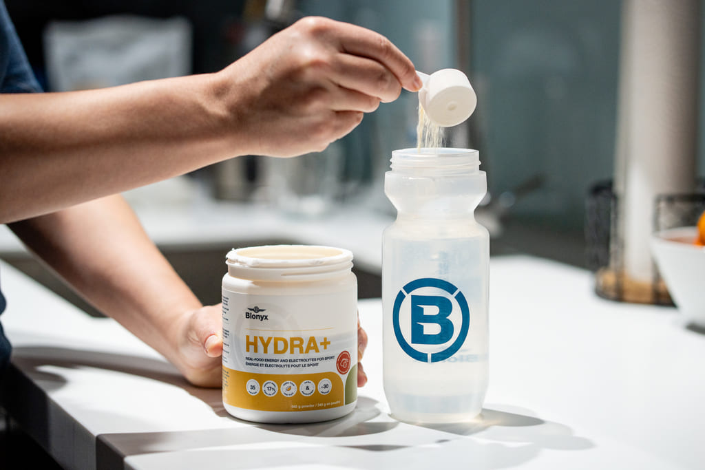 Pouring Hydra+ into a Blonyx Bottle