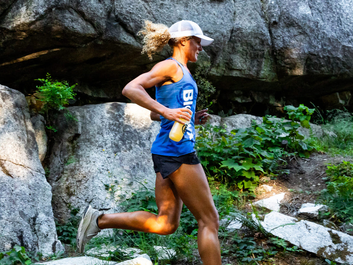 Maya running on a forest trail