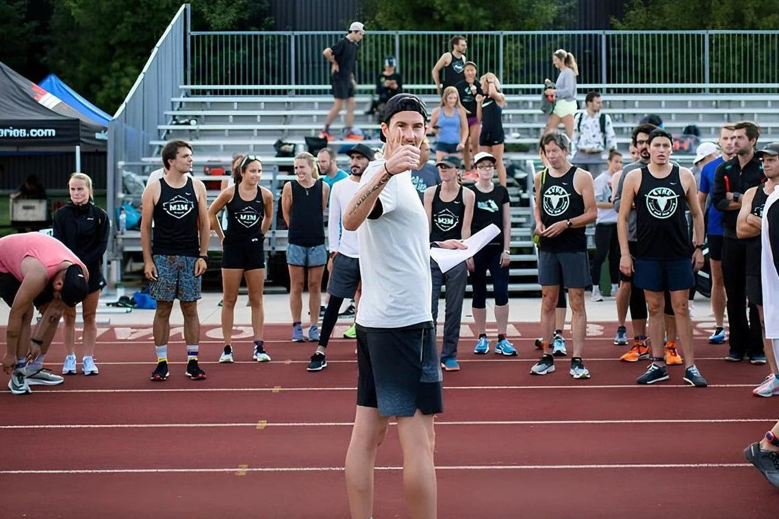 Rob Watson coaching a group of runners