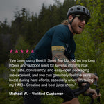 Cyclist riding outdoors with a testimonial describing Beet It Sport Top Up 100 energy gels, highlighting their taste, easy-open packaging, and performance benefits during long rides and hard efforts.