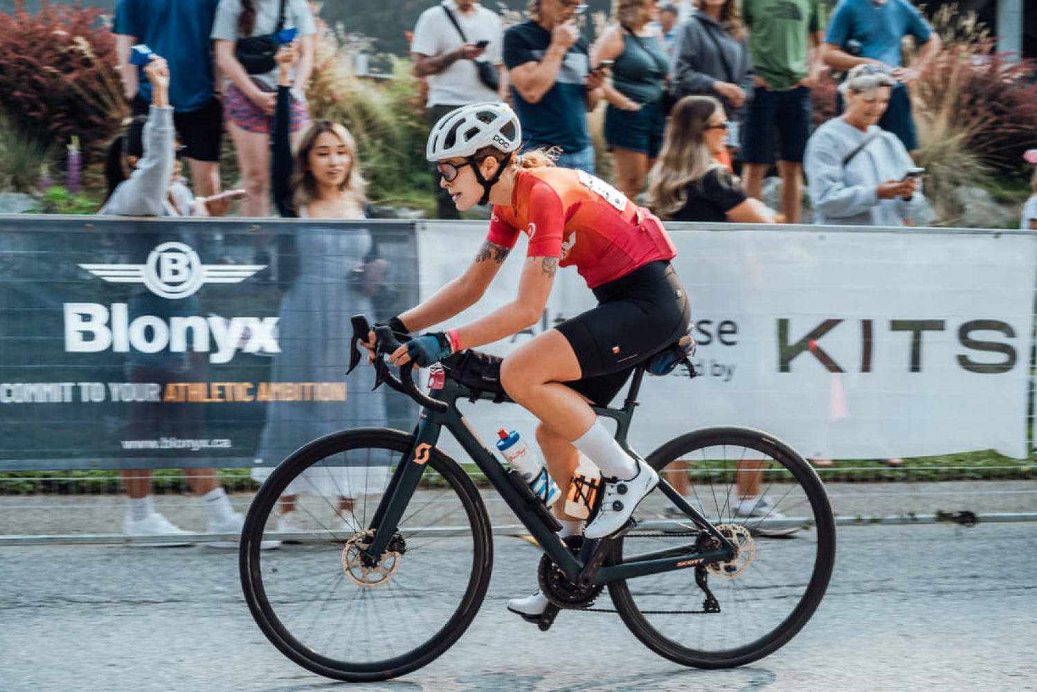 Cyclist about to cross the finish line at the RBC GranFondo Whistler