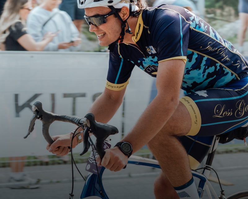 Cyclist powering to the finish line at the RBC GranFondo Whistler