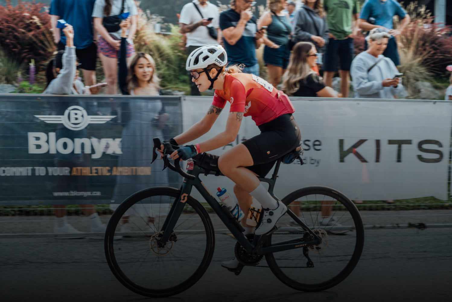 Cyclist crossing the finish line at the RBC GranFondo Whistler